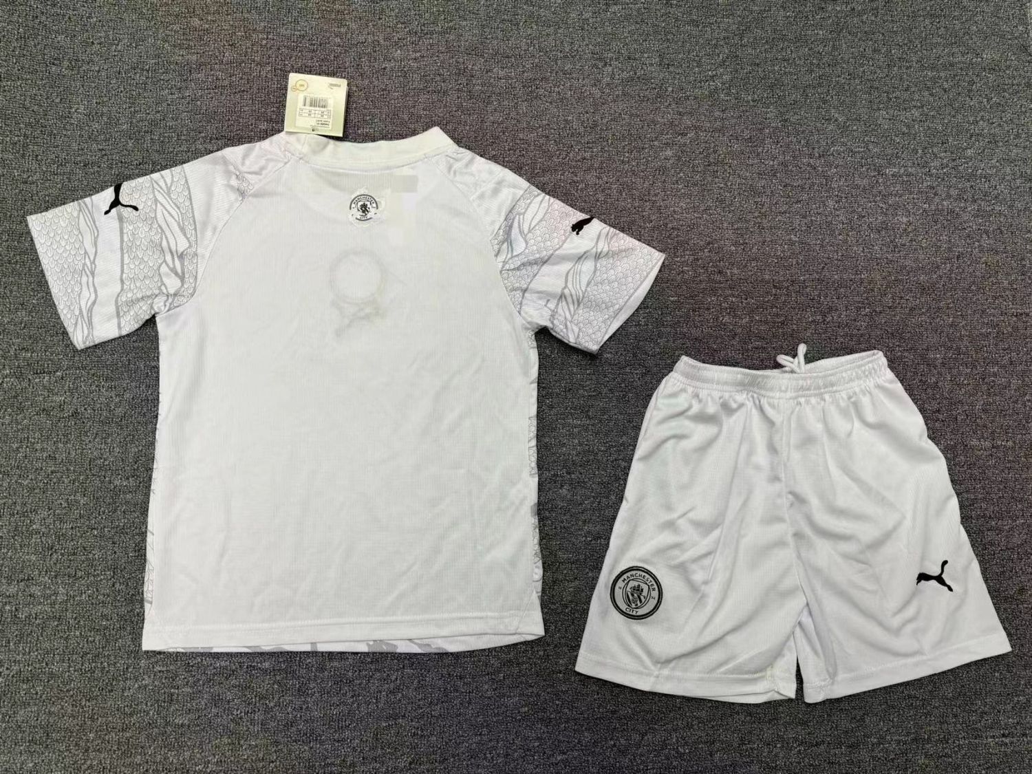 Manchester City Year Of The Dragon Kids Suit 23/24